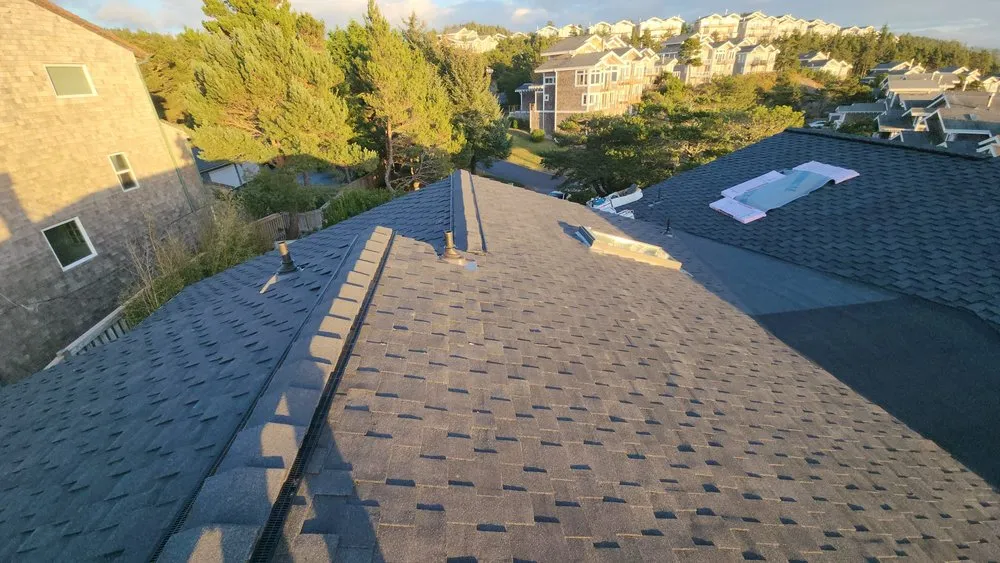 Slide of Road Runner Roofing