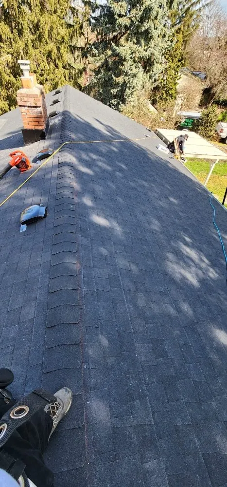 Slide of Road Runner Roofing