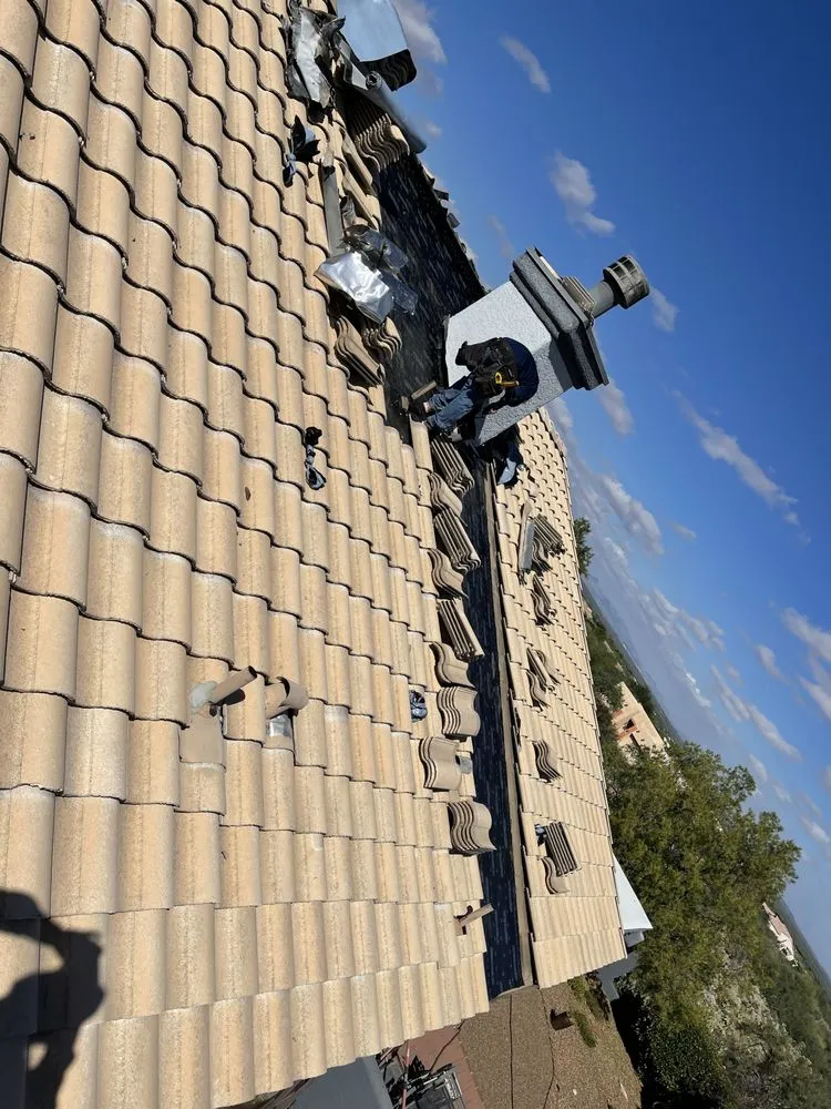 Slide of Roadrunner Roofing