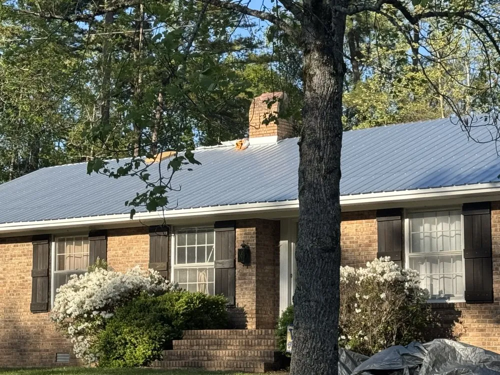 Slide of Robbie Melton Roofing