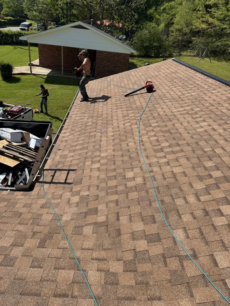 Slide of Robbie Melton Roofing