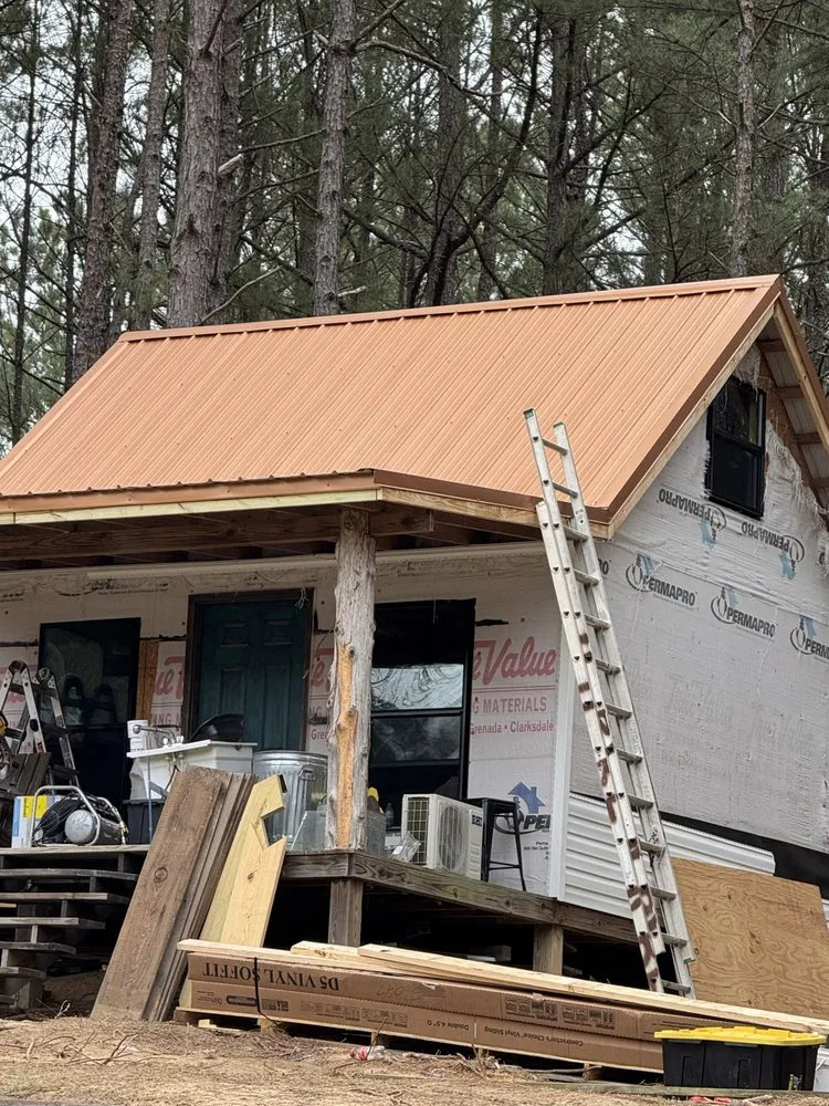 Slide of Robbie Melton Roofing
