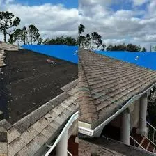 Slide of Robbies Roofing