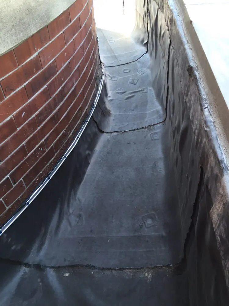 Slide of Robert Roofing and Gutters