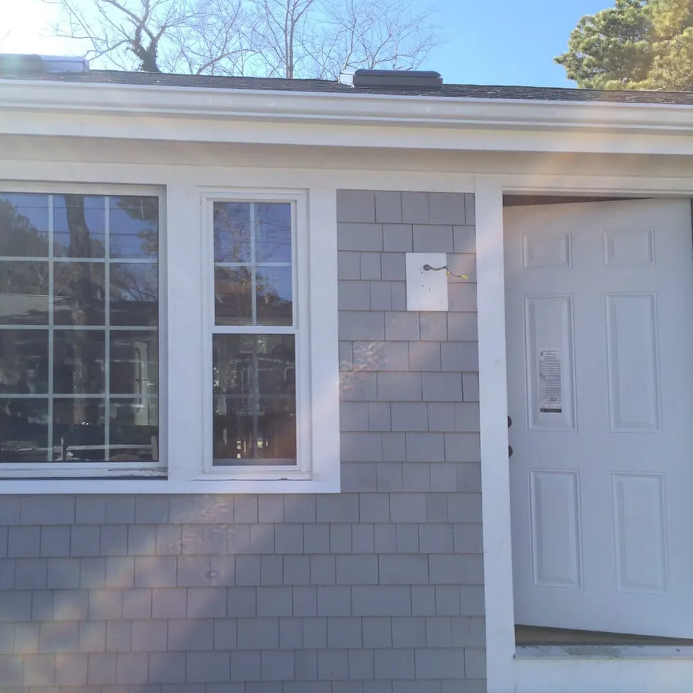 Slide of Robert Roofing and Gutters