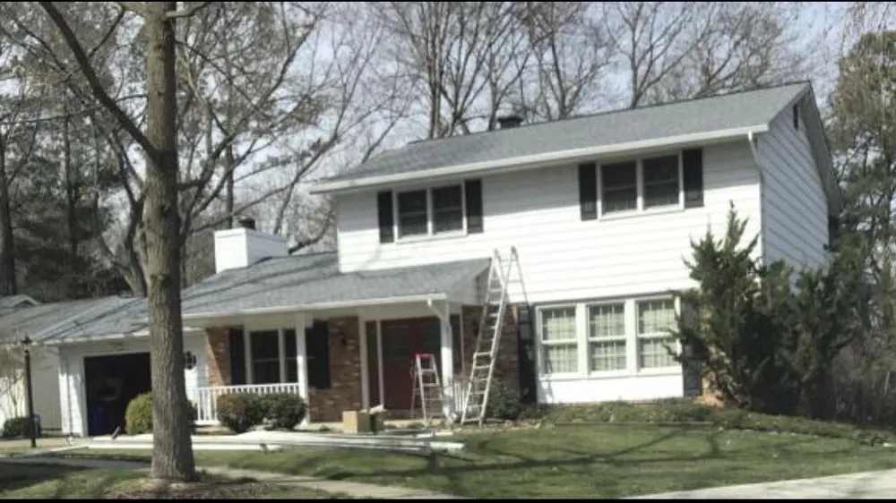 Slide of Roberts Expert Roofing & Gutters