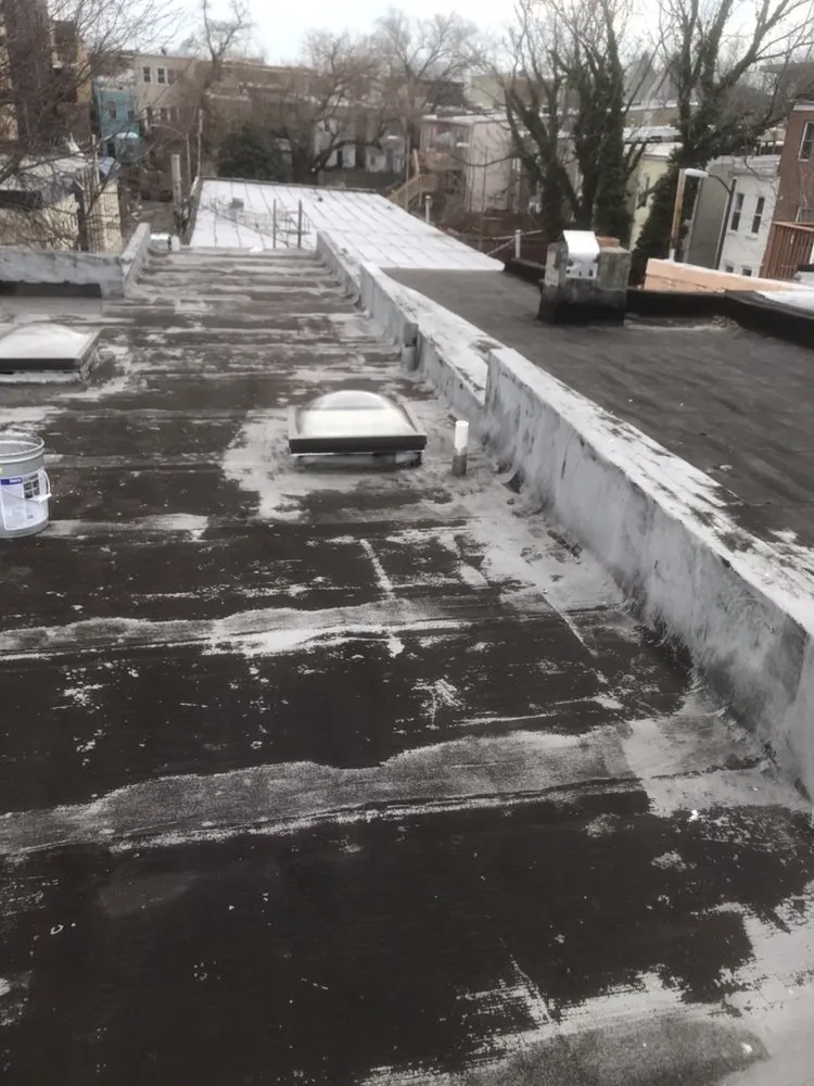 Slide of Roberts Expert Roofing & Gutters