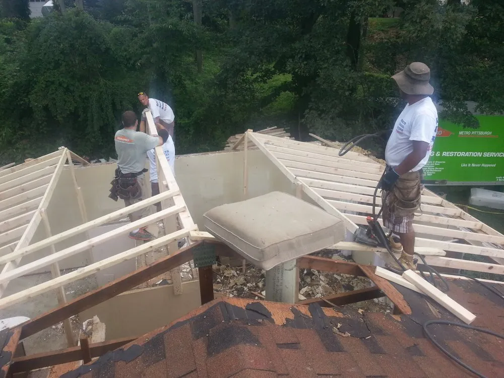 Slide of Roberts National Roofing