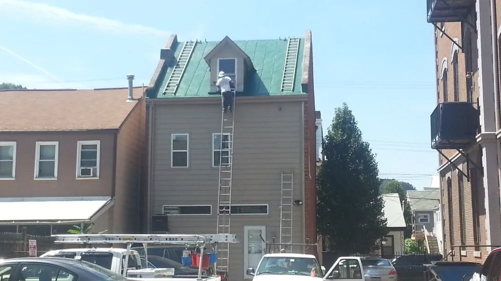 Slide of Roberts National Roofing