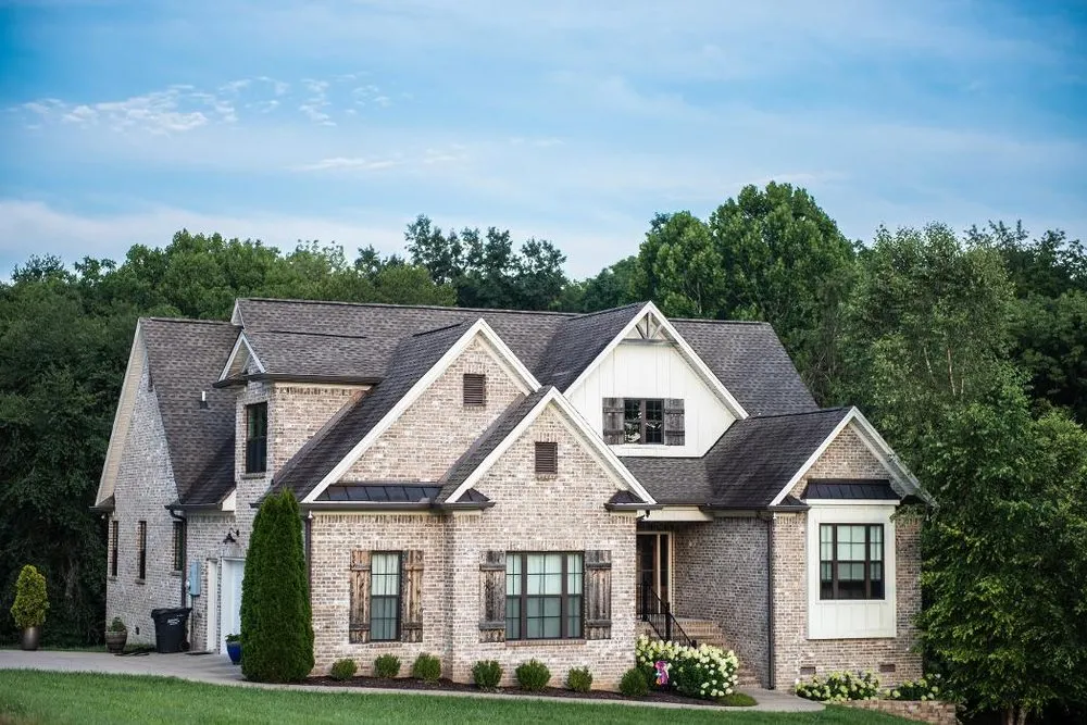 Professional flat roof repair after storm damage in Castalian Springs, TN by Roberts Roof Repairs