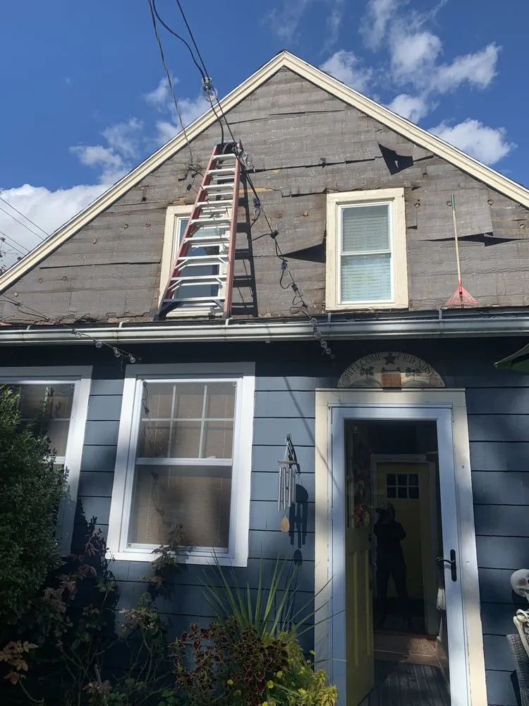 Slide of Roberts Roofing & Siding