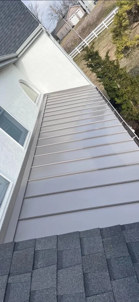 Slide of Robert's Roofing