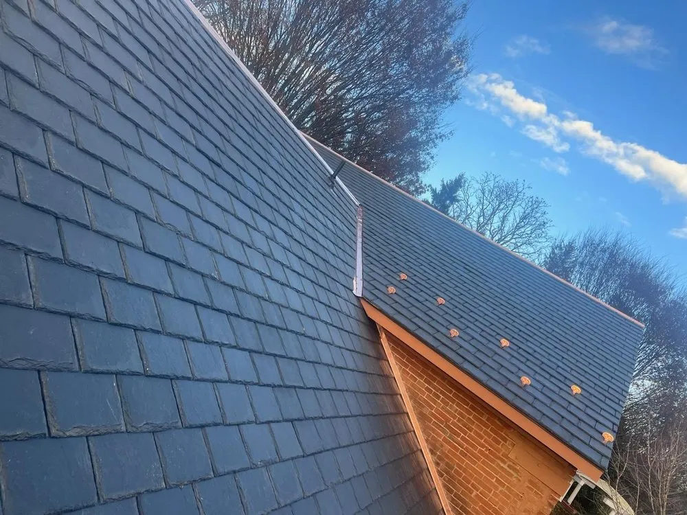 Slide of Robert's Roofing