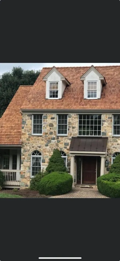 Slide of Robert's Roofing