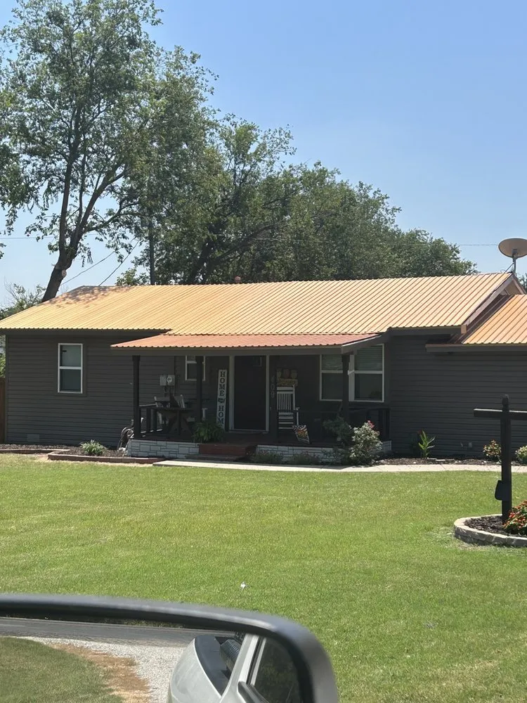 Slide of Robert's Siding & Metal Roofing