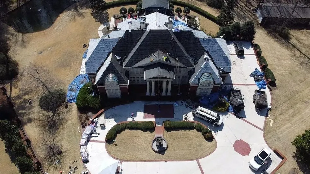 Slide of Robin Hood Roofing