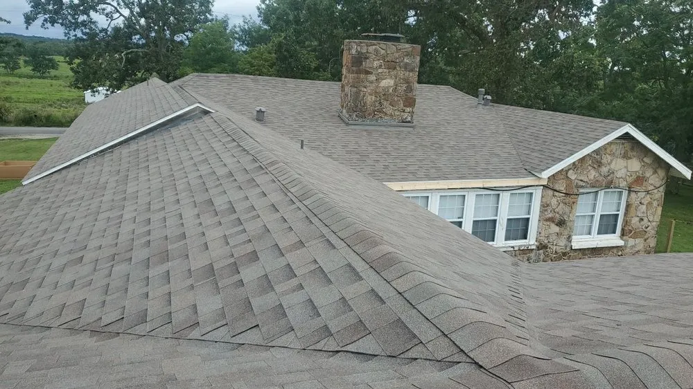 Slide of Robin Hood Roofing