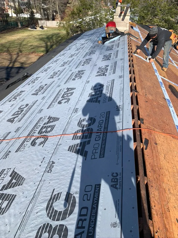 Slide of Rob's Roofing