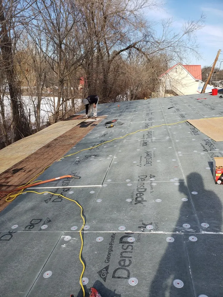 Slide of Roc roofing and construction