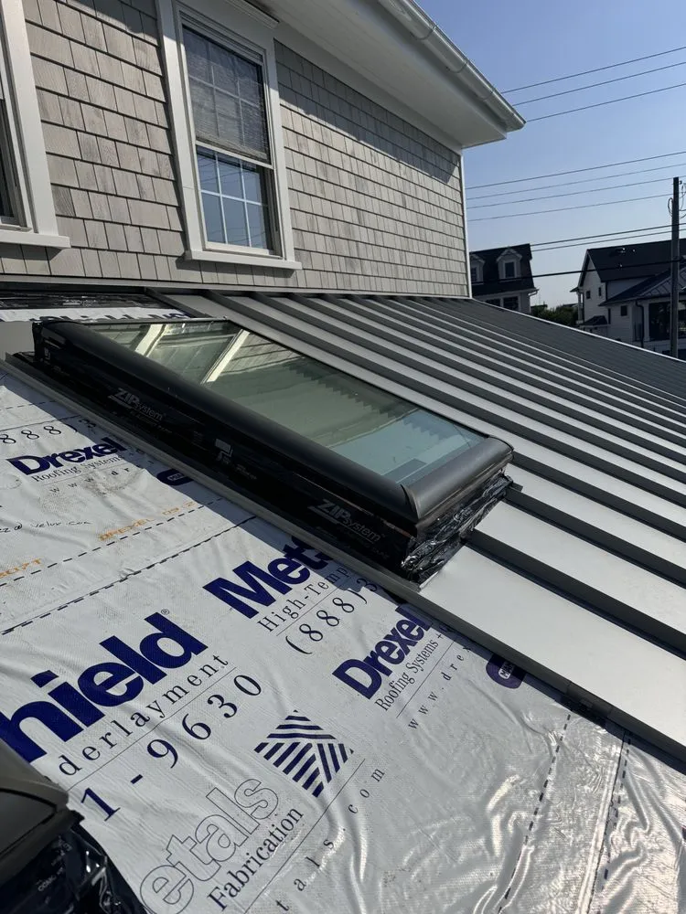 Slide of Rocca's Roofing and Siding