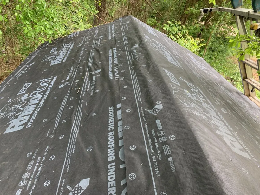 Slide of Rocco’s Roofing