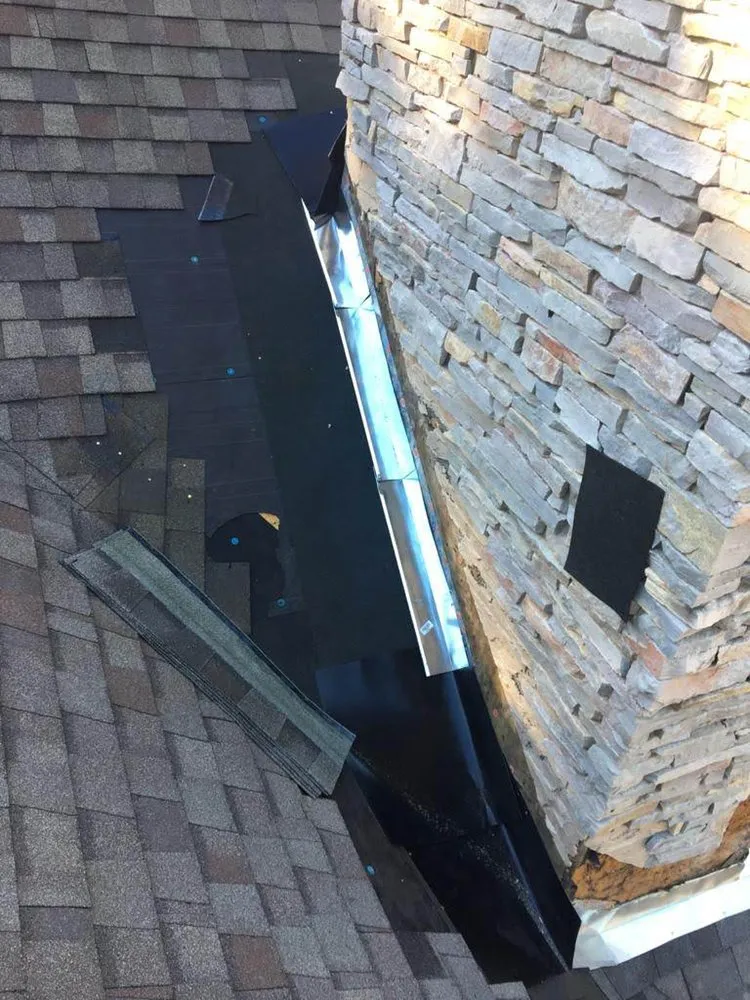 Slide of Rocco’s Roofing