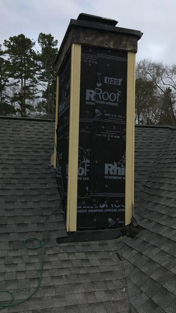 Slide of Rocco’s Roofing