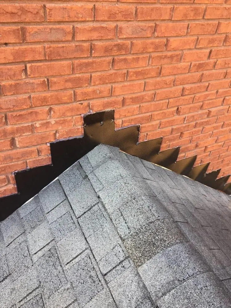 Slide of Rocco’s Roofing