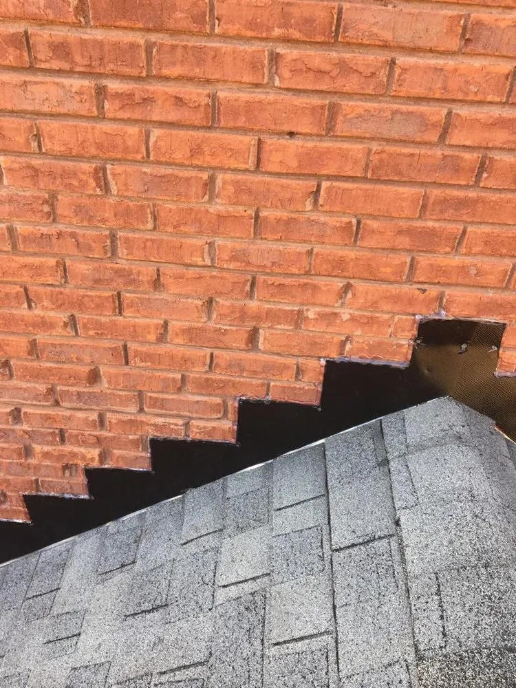 Slide of Rocco’s Roofing