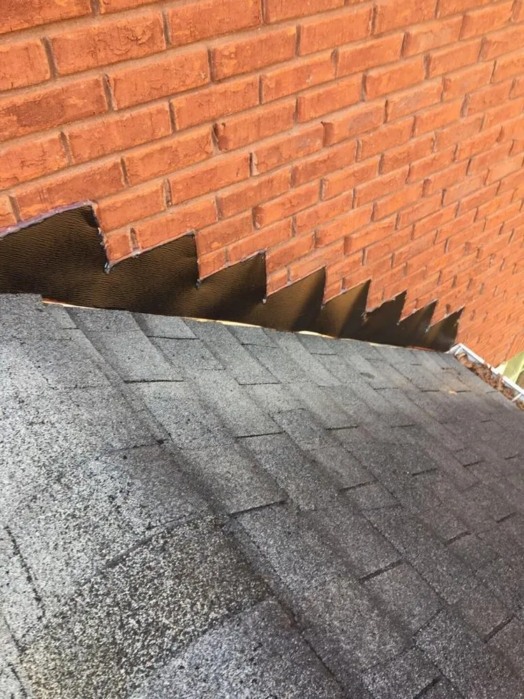 Slide of Rocco’s Roofing