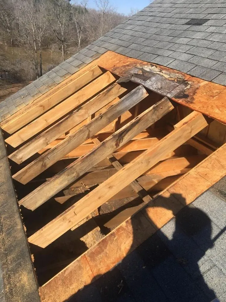 Slide of Rocco’s Roofing