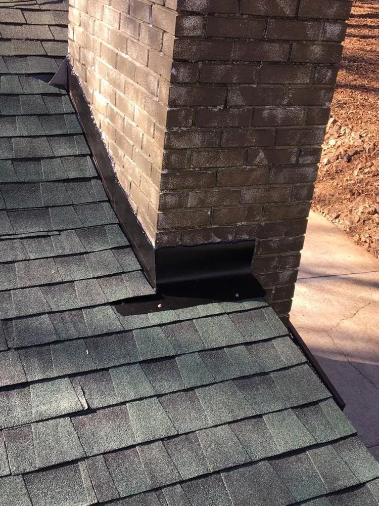 Slide of Rocco’s Roofing