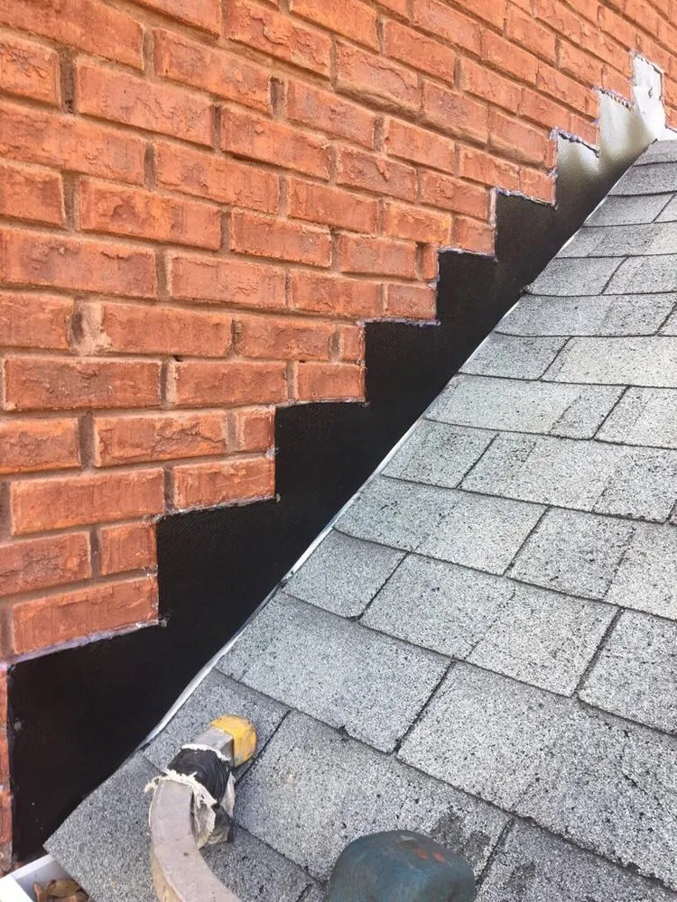 Slide of Rocco’s Roofing