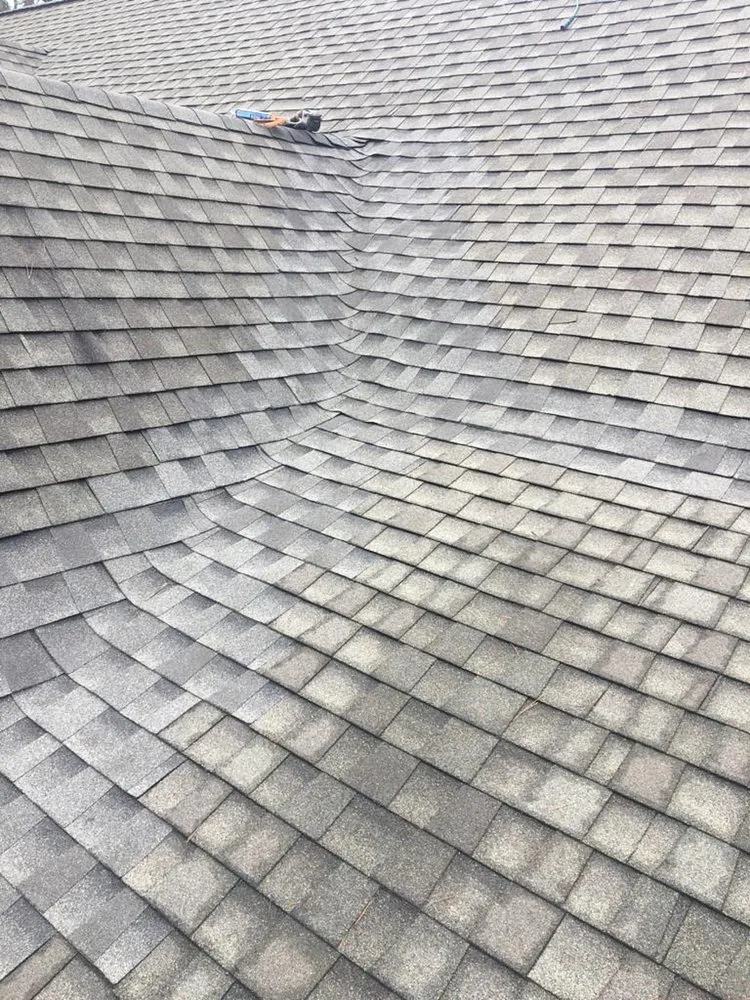 Slide of Rocco’s Roofing