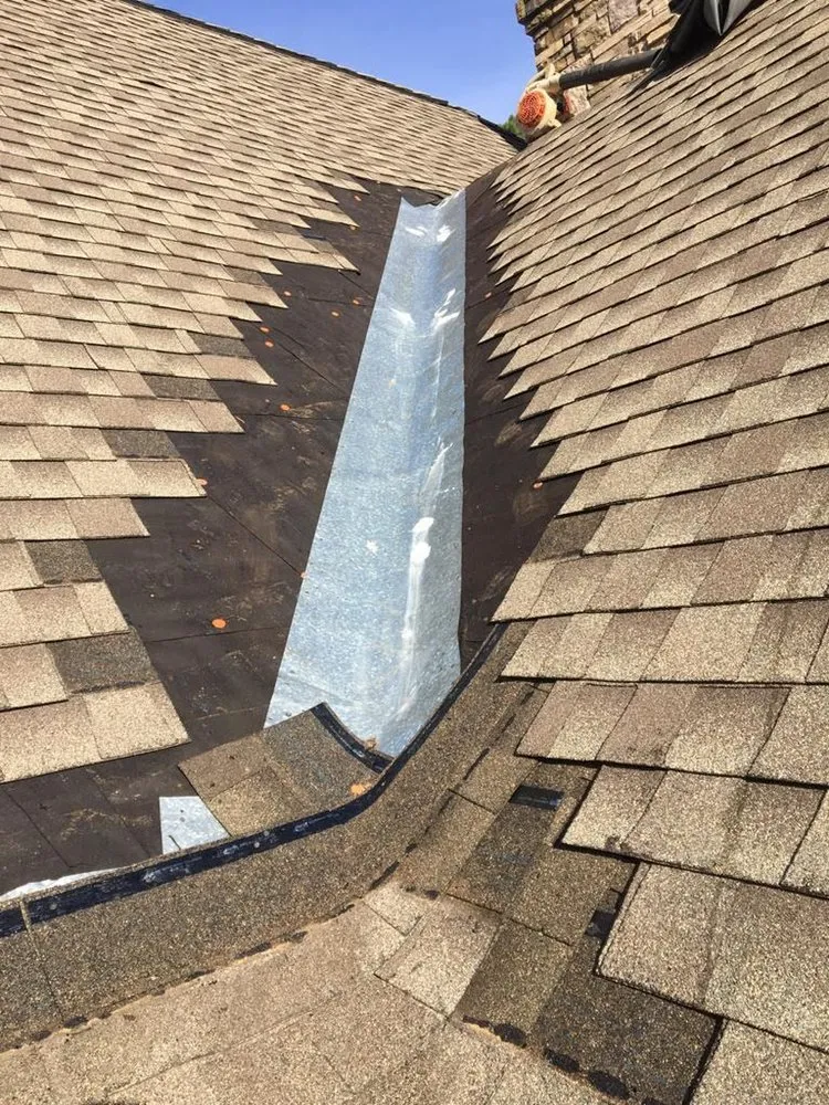 Slide of Rocco’s Roofing