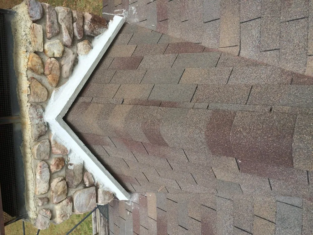 Slide of Rock City Roofing