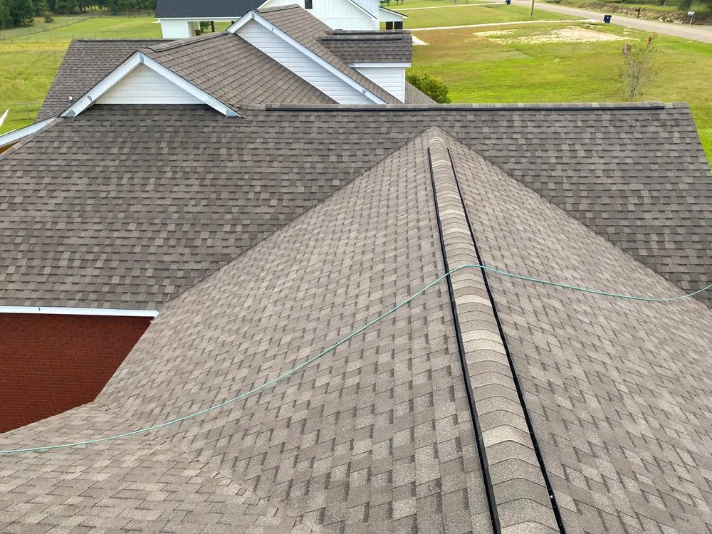 Slide of Rock Creek Roofing