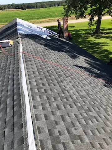 Slide of Rock Creek Roofing