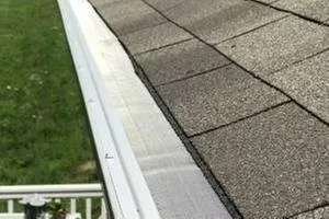 Slide of Rock Gutter Service