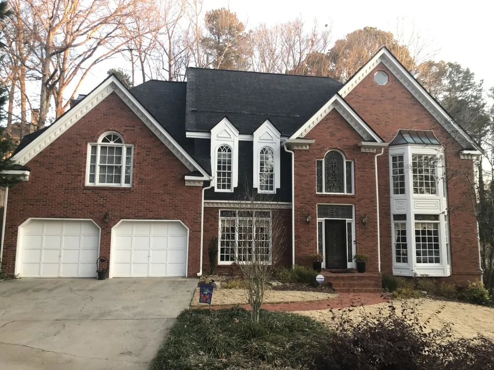 Slide of Rock House Roofing