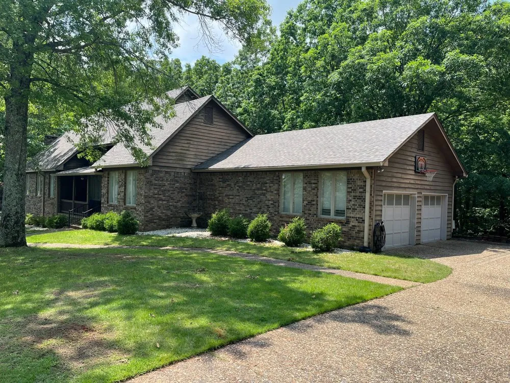 Slide of Rock Management Roofing