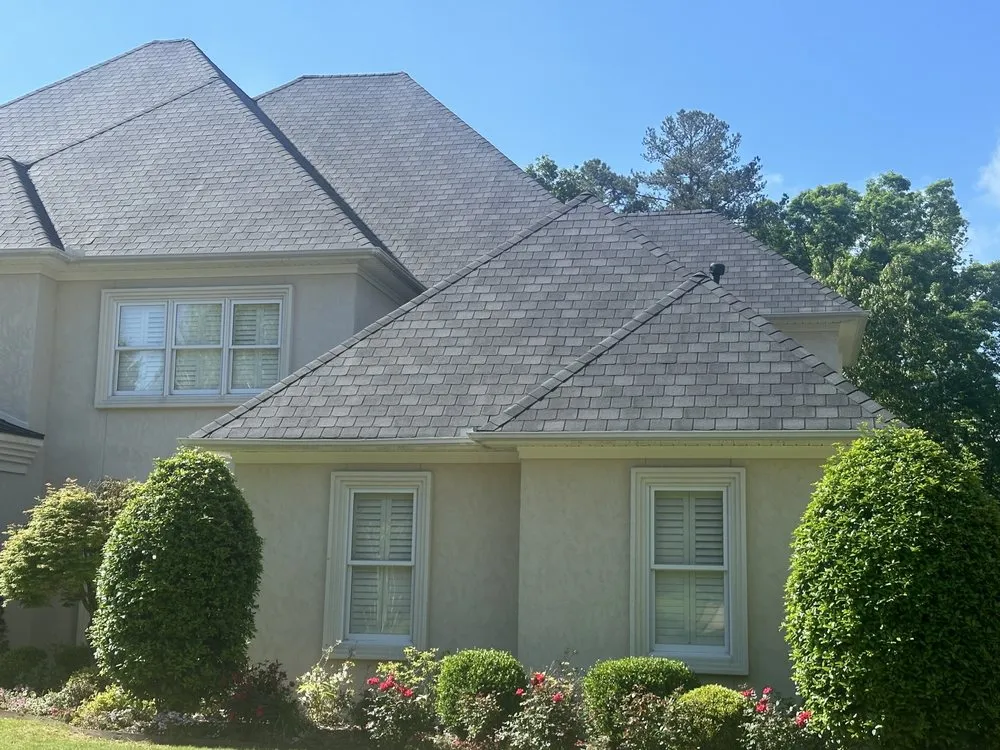 Slide of Rock Management Roofing