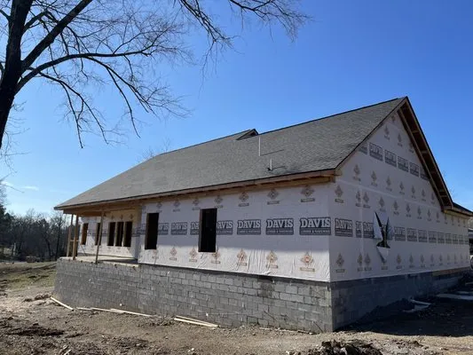 Rock Roofing And Remodeling Logo
