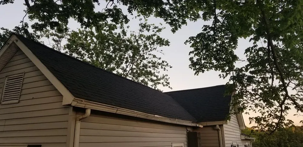 Slide of Rock Solid Roofers