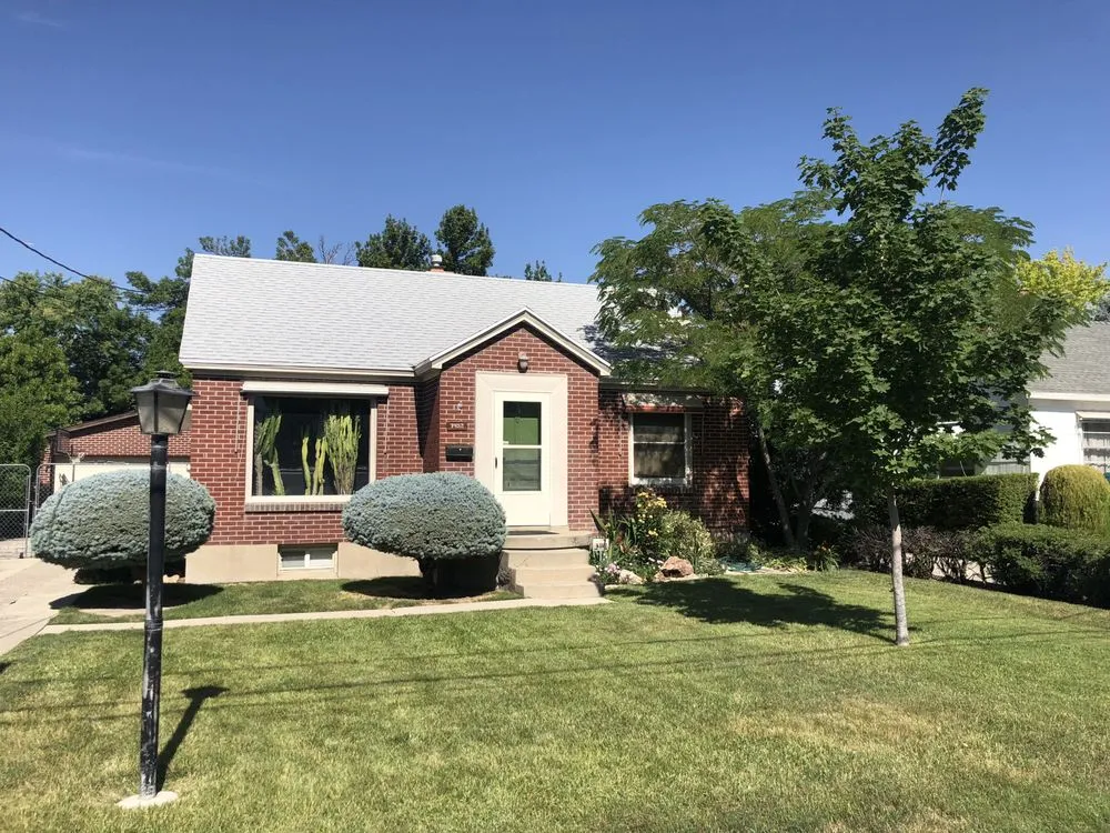 Slide of Rock Solid Roofing