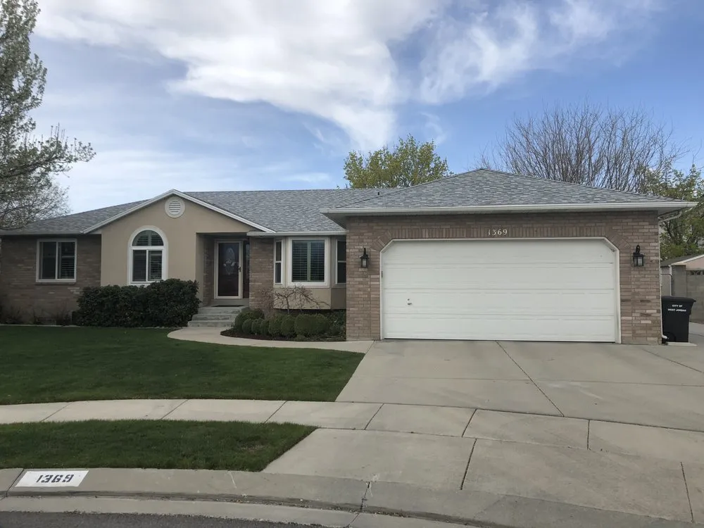 Slide of Rock Solid Roofing