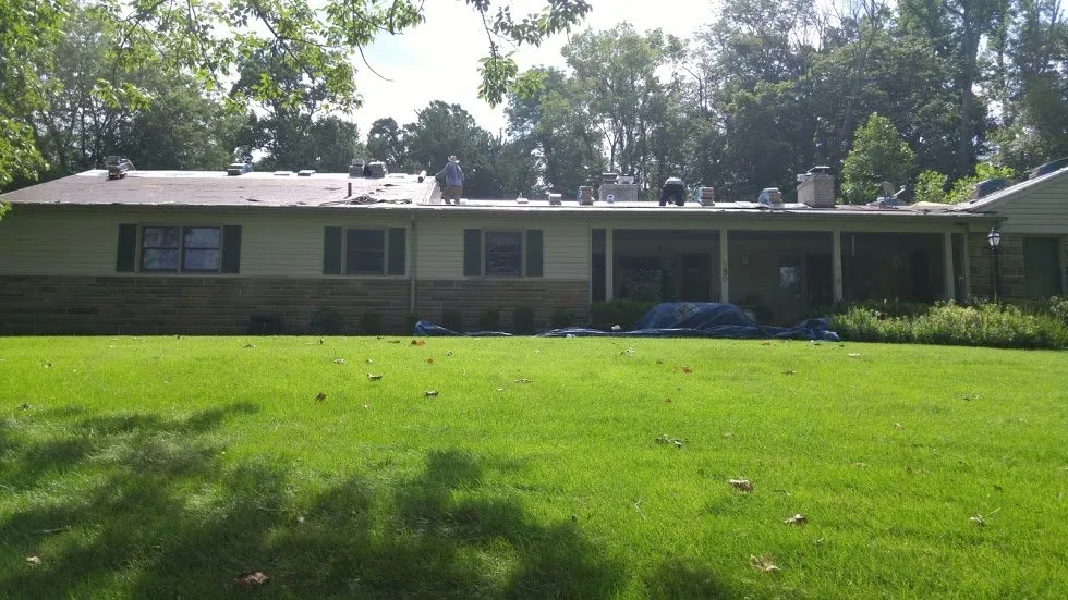 Slide of Rock Solid Roofing
