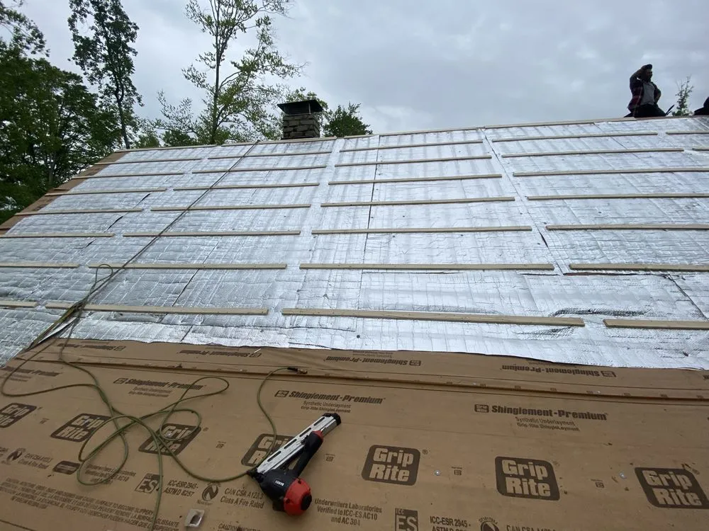 Slide of Rock Solid Roofing KY