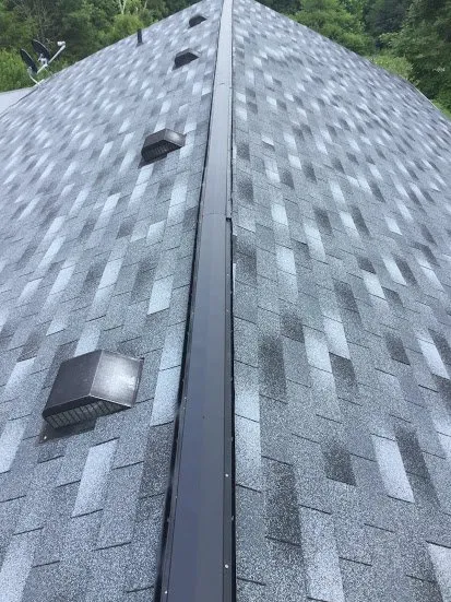 Slide of Rock Solid Roofing