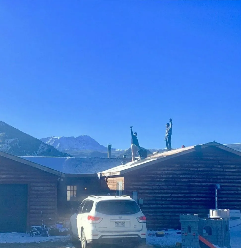 Slide of Rockies Roofing